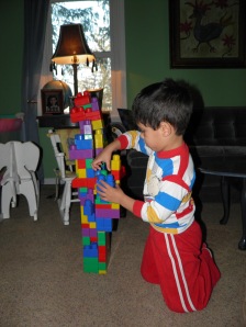 Bency building with the big Legos when he was 4 years old. He uses the smaller ones now I forgot to take a picture of his creation or mine for that matter before they were tore down!